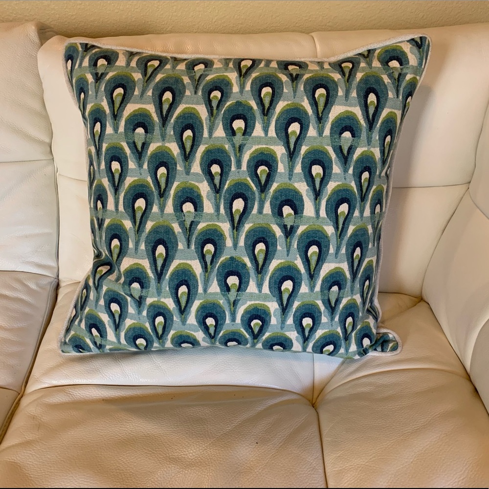 Down/feather filled decorator pillow.